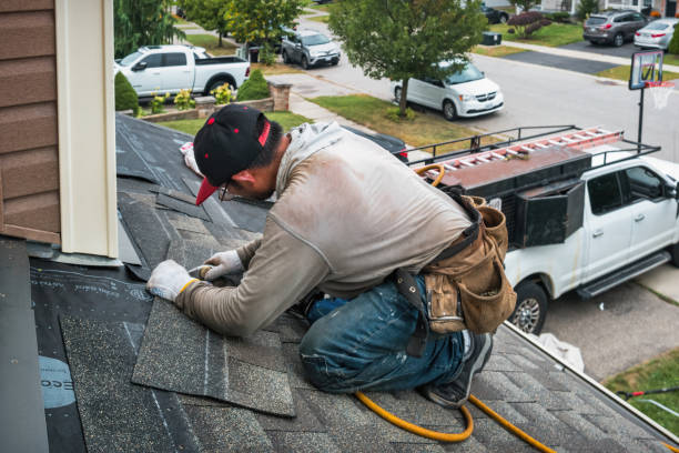 Professional Roof Inspection technician working in Oakham, MA